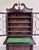 This is a gorgeous antique Empire flame mahogany secretary desk and bookcase with Georgian-influenced swan-neck pediment,...