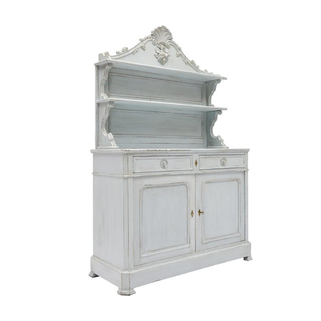 French provincial double corps buffet made of solid wood construction called "Saint Hubert". This piece has been finished...