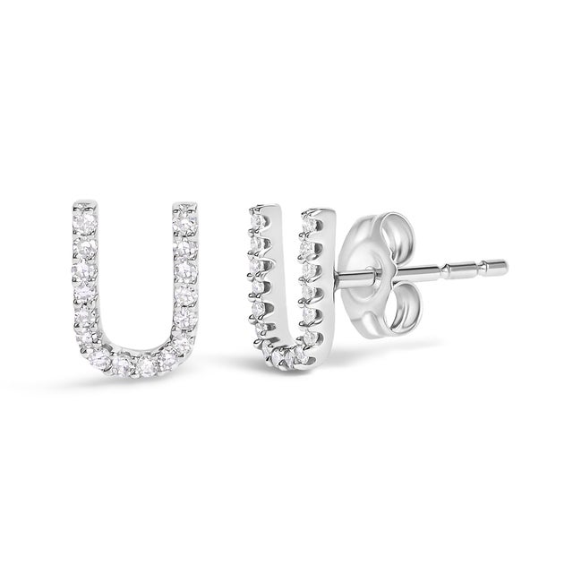 Expertly crafted to symbolize individuality and grace, this exquisite "U" initial stud earring is fashioned from radiant...