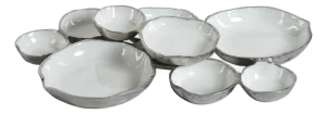 Cluster of Nine Round Serving Bowls with White Enamel Interior