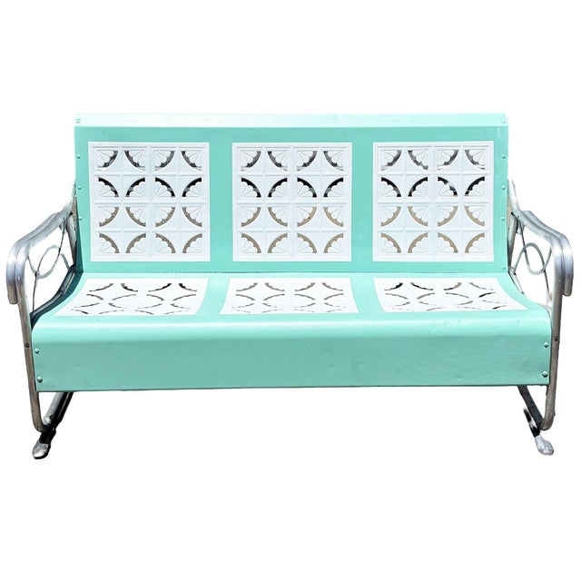 Mid-Century Modern outdoor sofa bench crafted from a tubular aluminum frame and steel seat finished in new cheerful aqua...