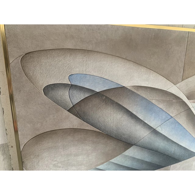 Assemblage of sheets of felt painted and mounted on board with a brushed brass frame. Very flowing design depicting a...