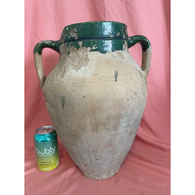 Bring authentic Old World texture and history into your space with this striking antique terracotta olive oil jar, hand-...