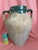 Bring authentic Old World texture and history into your space with this striking antique terracotta olive oil jar, hand-...