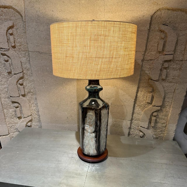 For your consideration, a vintage mid-century modern ceramic table lamp featuring a hexagonal, sculpted body with a drip...