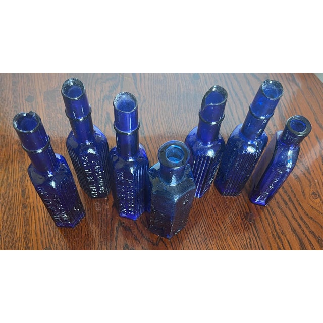 Curated Collection of 6 Victorian Cobalt Blue Apothecary & Poison Bottles For Sale - Image 4 of 8