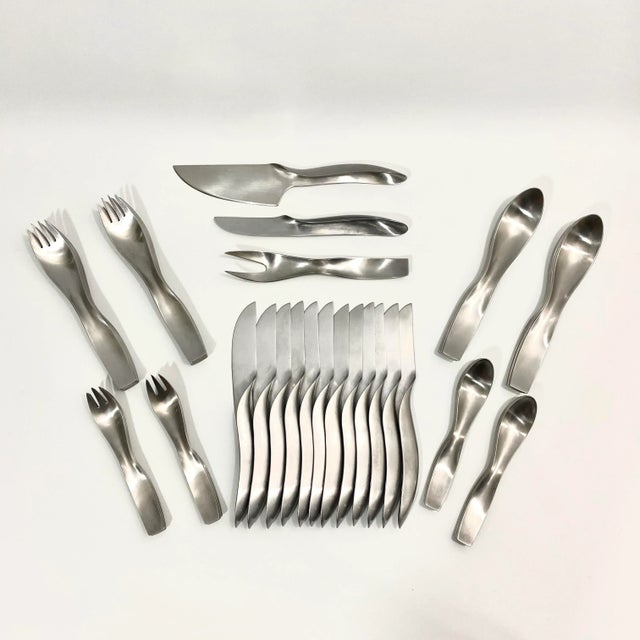 Rare János Megyik for Amboss avant-garde flatware service for 12. Each service includes 5 utensils: dinner fork,...
