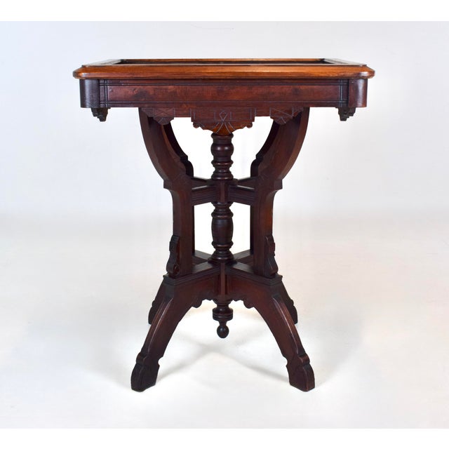 Antique Aesthetic Movement Eastlake Victorian carved Mahogany Parlor or side table with finial base and striking insert...