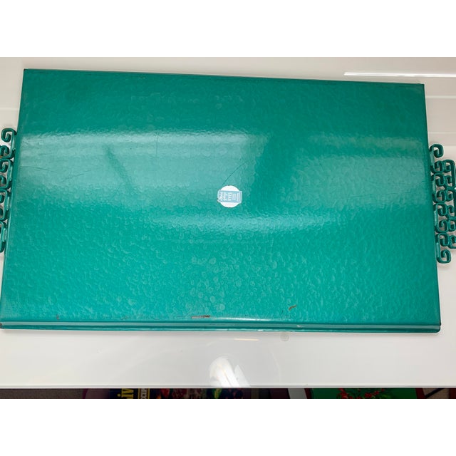 A striking mid-century enamel and brass serving tray by More Glaze by Kyes of Pasadena, California. Known for their...