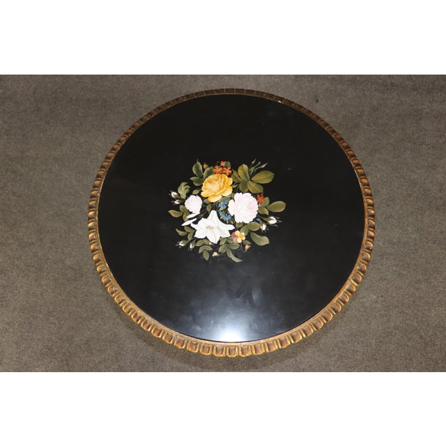 Dimensions: 21.75 inches high x 24.5 inches wide x 24.5 inches deep This elegant Italian Florentine table is a beautiful...