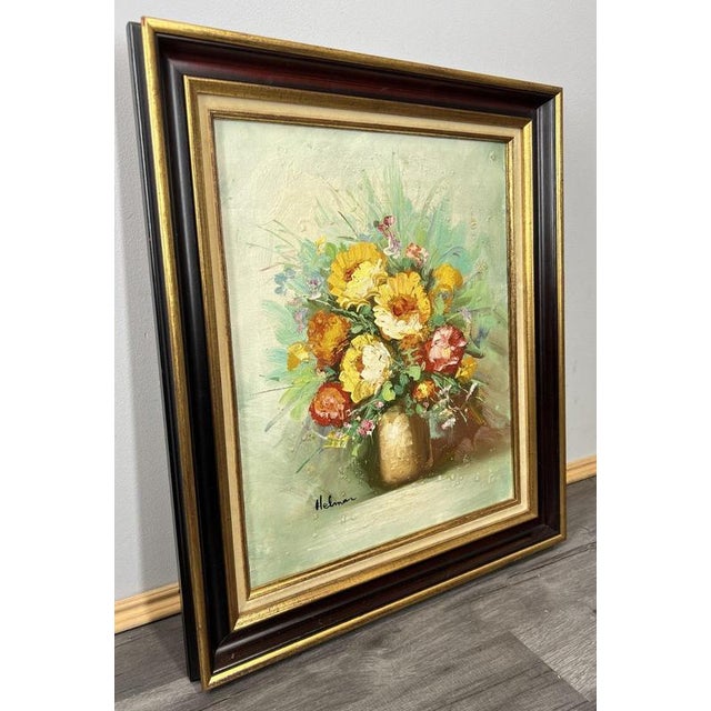 This charming Vintage French oil painting presents a vibrant floral still life, beautifully arranged with warm yellows,...