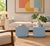 A striking pair of 1980s laminate cube side tables with a clean, architectural presence. Finished in a soft powder-blue...
