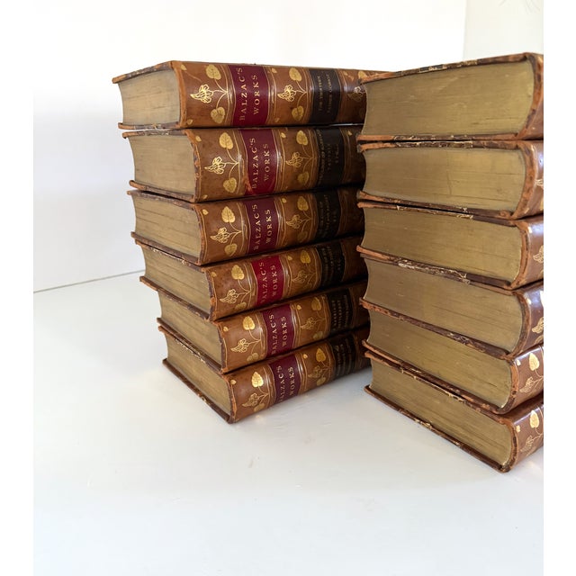 Beautiful leather bound French style collection of Honoré Balzac books. Rich cognac leather with marbled covers and...