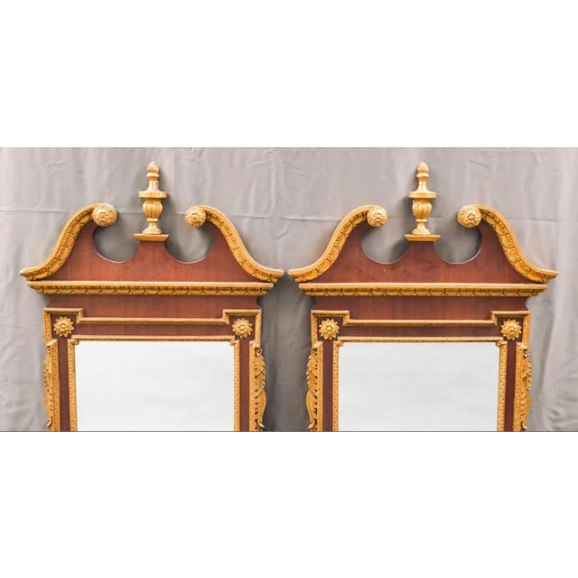 20th century pair of chippendale style mirrors Nicely made overall dimension 31 1/8 x 57H. Sight size 19 wide by 29h