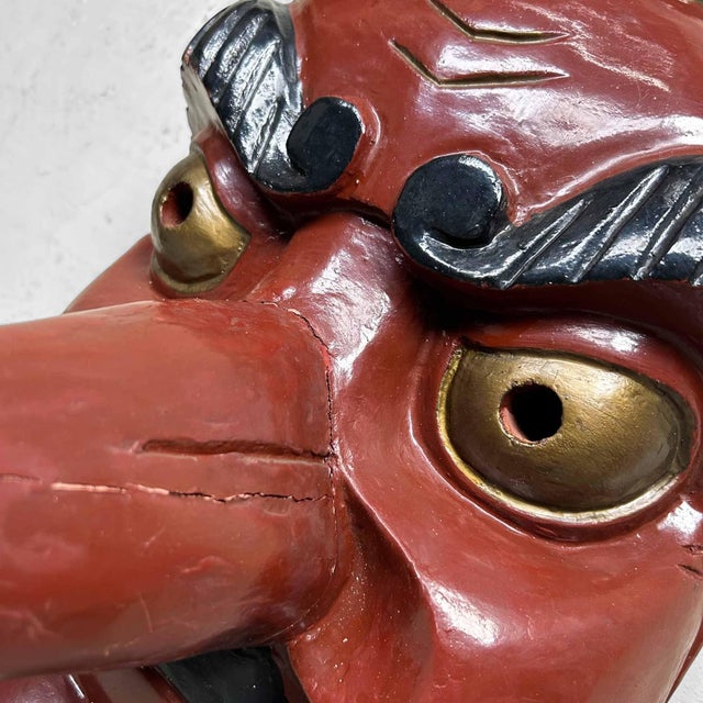 Wooden Tengu Mask, 1950s, Japan. Dimensions: Height 48 cm, Width 30 cm, Depth 42 cm. This beautiful wooden Tengu mask from...