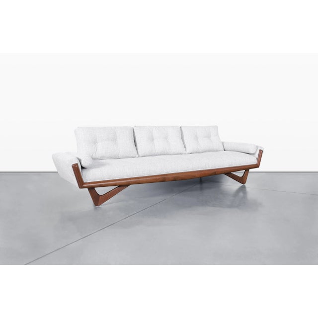 Mid-century modern Adrian Pearsall walnut gondola sofa for Craft Associates, USA, 1960s. Model 2404-S exemplifies Adrian...