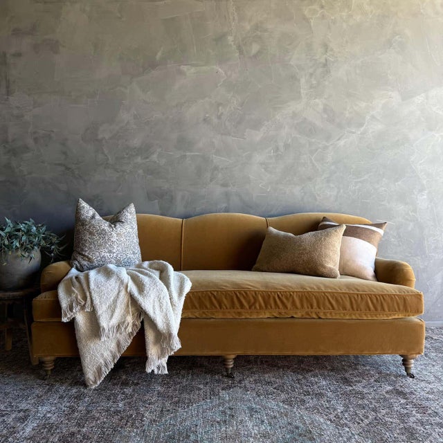 Introducing Our Modern English Sofa in beautiful rich Caramel Mustard tone. This piece is designed to be the centerpiece...