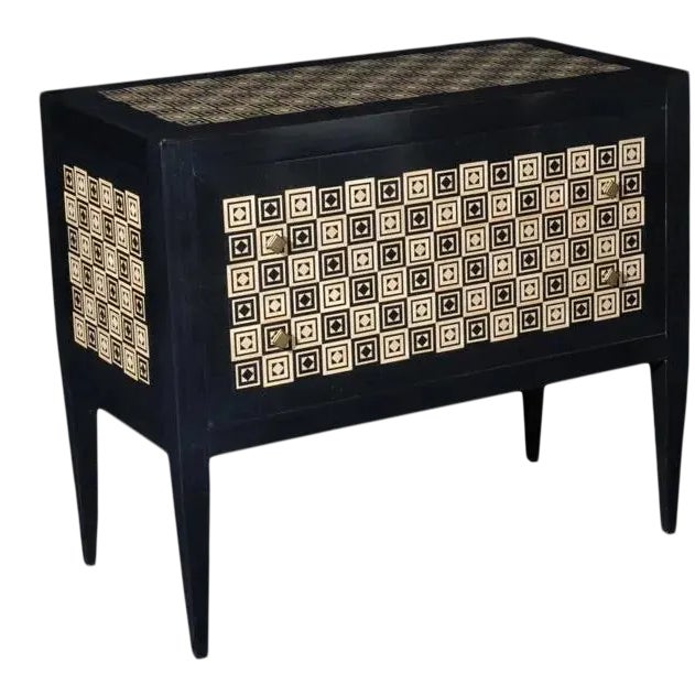 Modern two drawer chest featuring an ebony and ivory color diamond shaped inlaid design within the field on top, sides and...