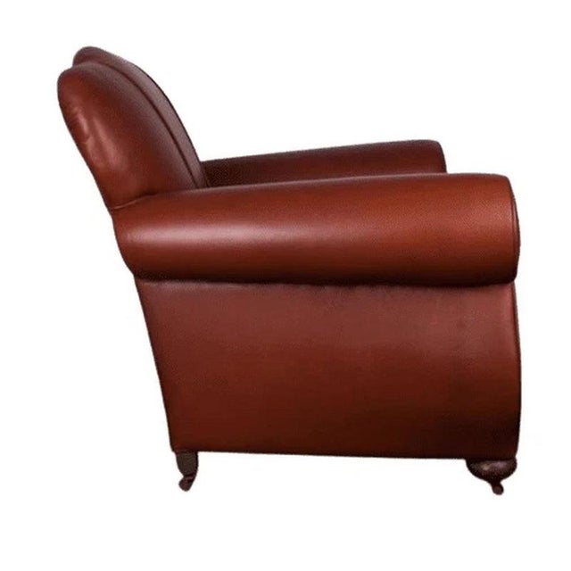 A handsome British Art Deco club armchair dating to circa 1930, combining generous comfort with the sculptural curves and...