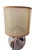 Italian table lamp with a spherical base in Murano glass, from the 1970s. The glass features brown shades with a marble...