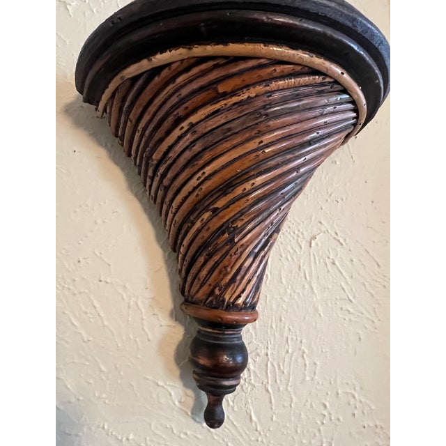 A pencil reed rattan wall shelf in the style of Gabriella Crespi. Woven top. Great accent piece.