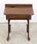 Antique school row desk with dark tone wood desk and seat on industrial style cast iron legs. Both the seat and desk can...