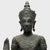 This standing Buddha figure from Thailand wears a serene expression of stillness and calm. Cast of bronze alloy in the...