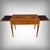 A louis xvi style writing desk, crafted from wood marquetry. The top features a superb rosewood veneer arranged in a...