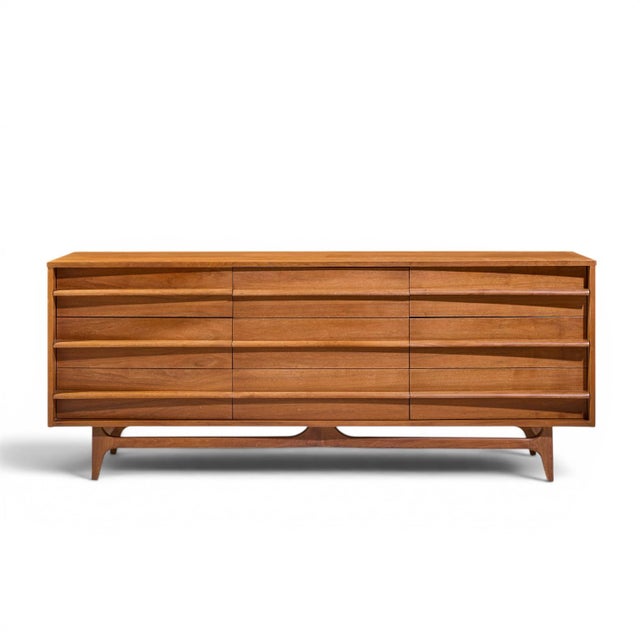 Young Manufacturing Mid Century Walnut Curved Lowboy Dresser This lowboy measures: 80 wide x 20.75 deep x 32.5 inches high...