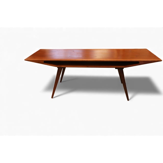 A very well-made and highly unusual coffee table that can be considered among the most recognizable and talked-about...