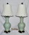 Splendid pair of Chinese Long Quan porcelain table lamps feature lovely raised peony floral and vine motifs and celadon...