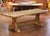 Crafted in France circa 1780, this antique monastery refectory table embodies the strength and rustic character of...