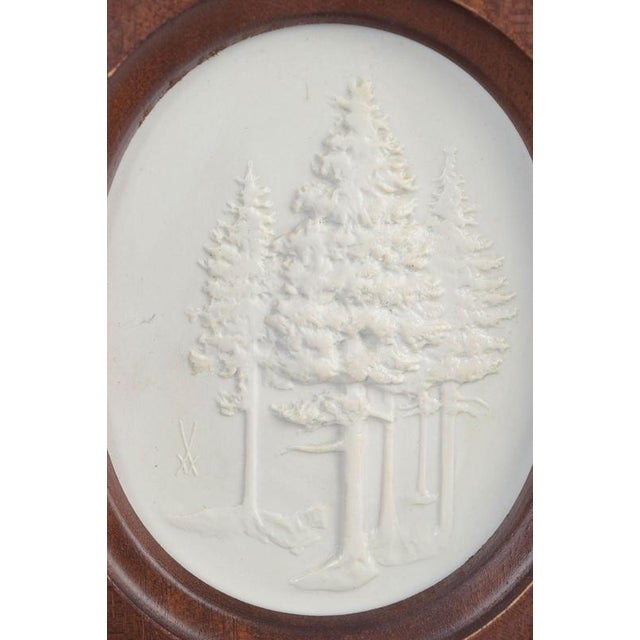 Meissen Biscuit plaque, c. 1970s. Relief plaque in white biscuit porcelain with a stylised nature motif depicting trees,...