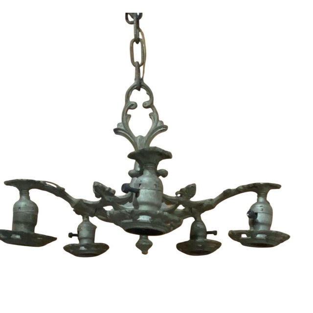 17” across 14 “ tall 27 wire Step back in time with this magnificent vintage metal light fixture frame, a true testament...