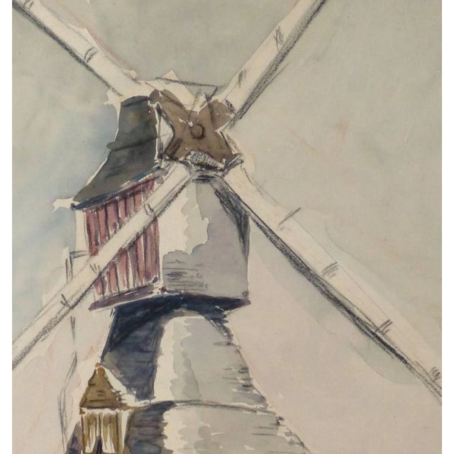 Picturesque French watercolor of a windmill in tranquil cool hues, circa 1920. Original artwork on paper displayed on a...