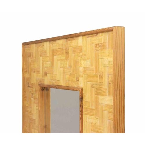 Elegant Italian wall mirror produced during the 1970s, distinguished by its refined geometric design and the warm natural...