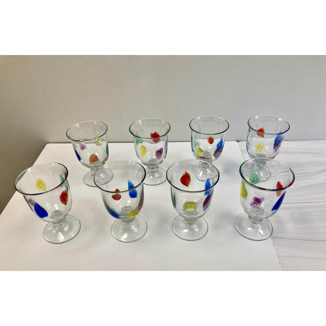 This multi-colored leaf pattern by Dansk was discontinued inn 2003. These all-purpose wine glasses would be charming...