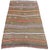 A beautiful vintage kilim, handwoven in central Turkey circa 1960 featuring a traditional, multicoloured banded design in...
