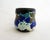 Small Art Deco vase/pot, truncated cone-shaped body slightly tapered in the center, with abstract and stylized floral...