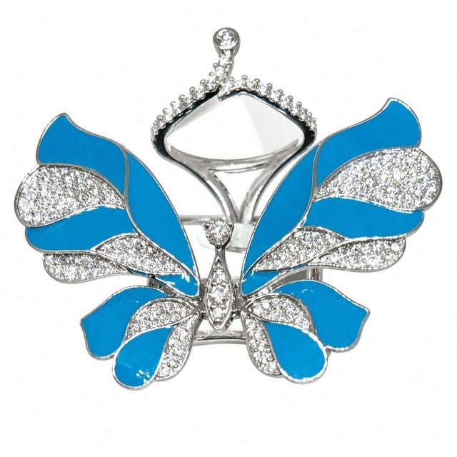 Gw=17.11gm Nw=16.39gm Diamond=1.55cts Enamel=2.05cts We encourage you to examine all the images provided for this item. To...