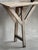 A Wabisabi Inspired Rustic Console Table. This early C20th French 'scrub' table made in poplar and ash wood, was...