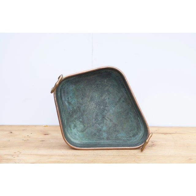 This exquisite antique French copper turbotière pot, dating to the mid-19th century, is a testament to the craftsmanship...