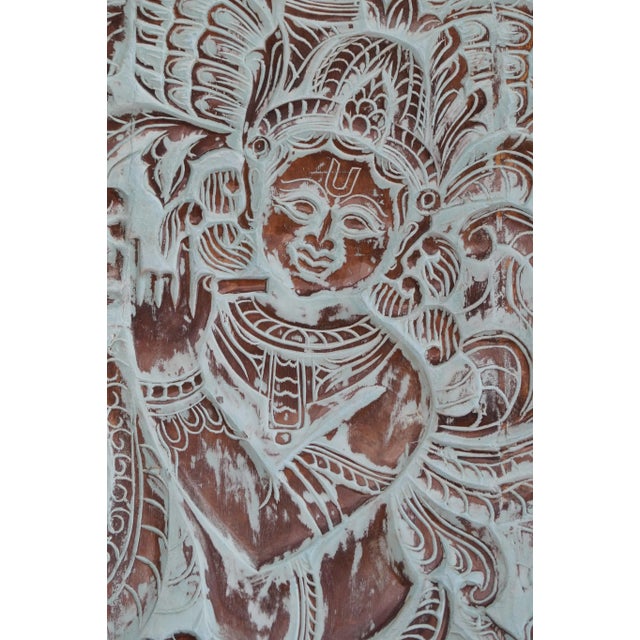 Elevate your home with this exquisite Vintage Krishna Carved Wood Door Panel, a masterful example of traditional Indian...