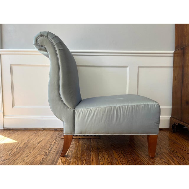 Pair of 1940s-inspired roll-back upholstered slipper lounge chairs by Barbara Barry for Baker Furniture. Sculptural curved...