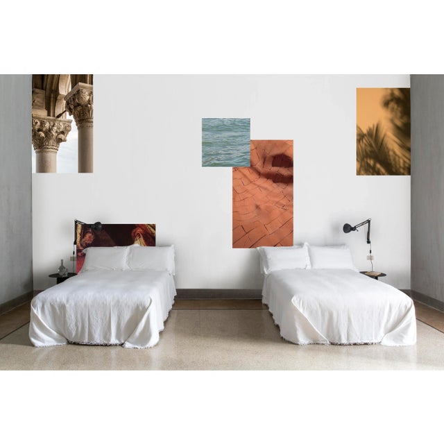 A photographic moodboard spread on the wall, that makes people able to travel through multiple “windows” opened on many...