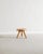 Rare French mid century wooden "Berger" low tripod stool in beatifully patinated cherry wood by Charlotte Perriand for...