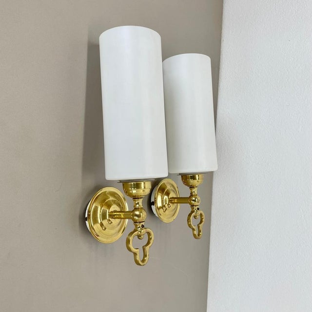 Article: Set of two Wall light scones Origin: Italy Age: 1970s This set of two modernist lights was produced in Italy in...