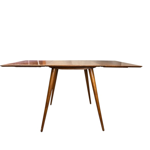 For sale is this great vintage all original maple drop leaf table made by Paul McCobb Each leaf is 17.25” table opened...