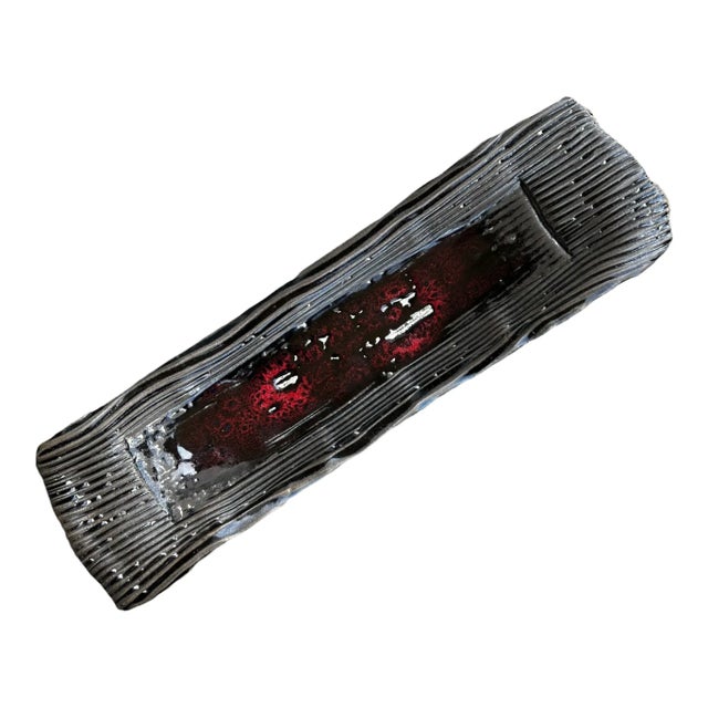 18"L x 5 3/8"W x 2 1/2" H A center piece or platter to enhance any table in your home. A black textural piece with ridges...