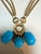 60 Ct Natural Sleeping Beauty Turquoise Necklace, Three Charm 18 Kt Gold For Sale - Image 4 of 8
